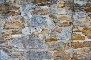 Texture of an old stone wall. Closeup