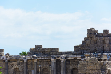 Fototapeta na wymiar ruins of Agora with columns and arches. the Greek period. Side, Turkey