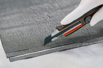 Cutting Raw Carbon fiber composite material with plastic utility knife