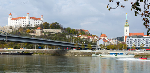 Fototapeta premium Bratislava castle and Saint Martins cathedral, river Danube