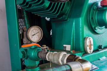 The pressure gauge, in the pneumatic system.