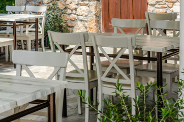 Chairs in the garden restaurant in Leptokaria, Greece 