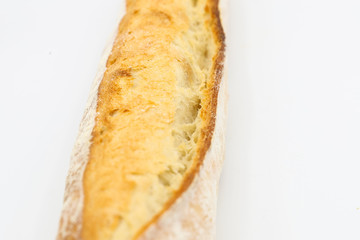 Fresh French baguette on white background