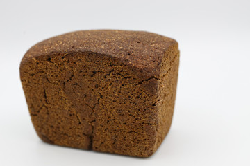 Fresh black bread on light background