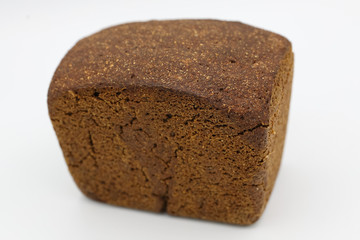 Fresh black bread on light background
