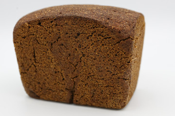 Fresh black bread on light background