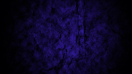 Naklejka premium The spot of purple light on the cave walls. Raw stone texture
