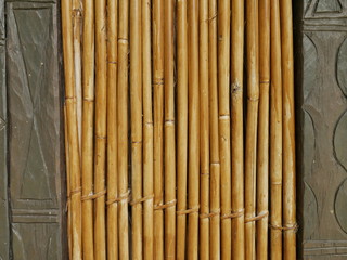 Bamboo Wall Framed by Stone Wall