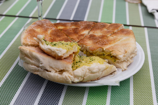 Bolo do caco Wheat bread on the table Traditional bread of Madeira island, Portugal