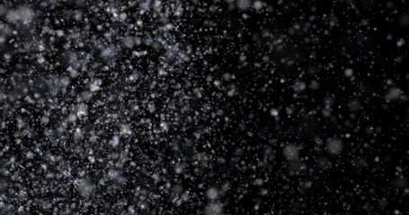Snowfall on a black backgroun