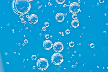 Water blue structure. Bubbles of oxygen under water. Macro