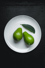 Fresh Avocado In white plate