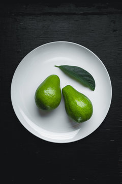 Fresh Avocado In white plate