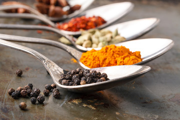 spices on a black rustic board