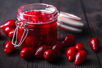 Homemade dogwood cornel jam in glass jar