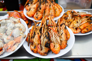 Grilled shrimps seafood on the table in market of Bangkok Thailand 