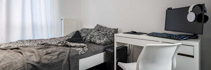 Minimalist bedroom with single bed