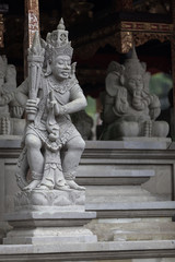 Old Carved Statue in a Balinese Temple