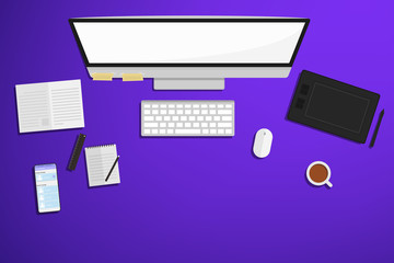 Top view of work space with computer ,phone notebook and cup of coffee.
