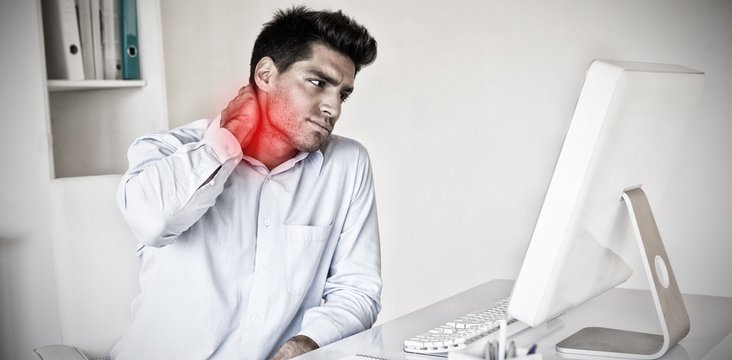 Composite image of casual businessman touching his sore neck