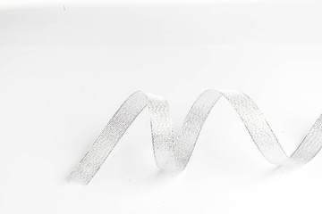 silver ribbon bow  on white isolated