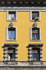 Fototapeta na wymiar Vintage window. Classic italian window. Milan. Italy. House, home, outdoor. Old building.