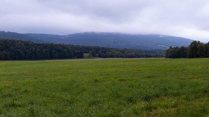 Panoramic view of field and mountains