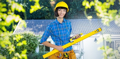 Composite image of female architect holding measuring equipment