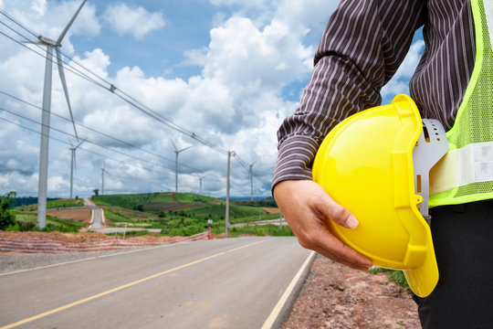 Engineer Worker At Wind Turbine Power Station Construction Site