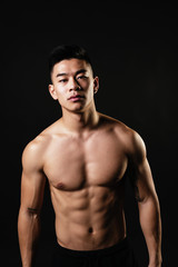 Portrait of young asian boy with fitness body