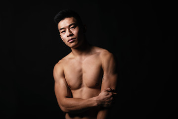 Fototapeta na wymiar Portrait of young asian boy with fitness body