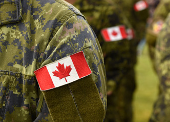 Canada patch flags on soldiers arm. Canadian troops