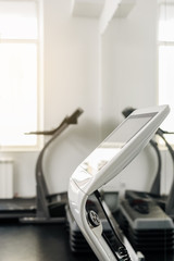 Electro muscular stimulation machine in modern fitness center