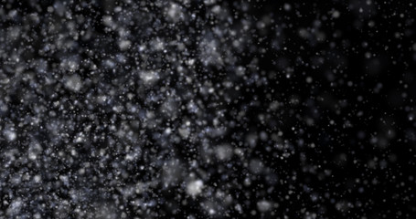 Snowfall on a black background