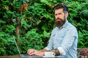 Hipster work online blog with notebook. Blogger create post while enjoy coffee. Create content for...
