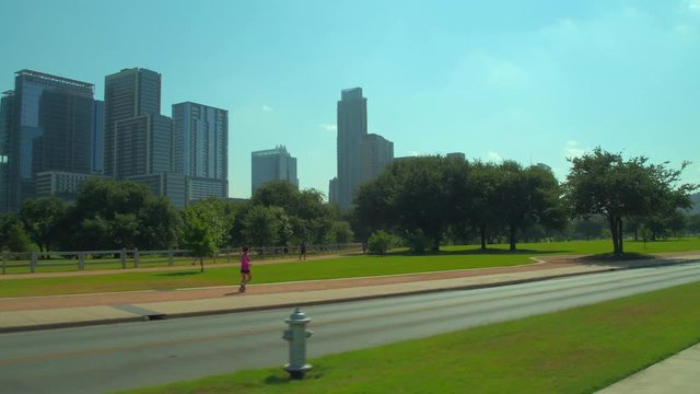 Woman running in a park Austin Texas