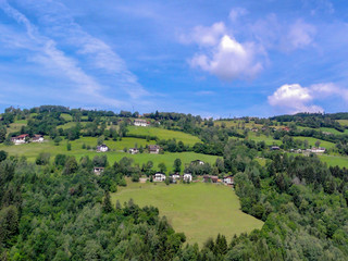 Fototapeta na wymiar Homes Dotting the Hillside in Austria