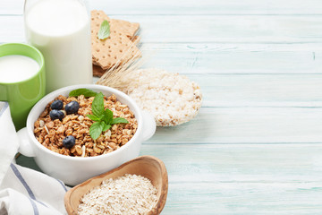 Healthy breakfast set with muesli, berries and milk
