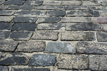 old cobblestone road for background or texture