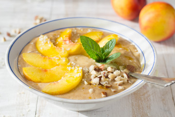 Smoothie with peach, nuts, sesame 