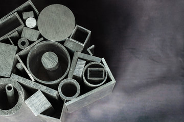 Different metal profiles on gray background