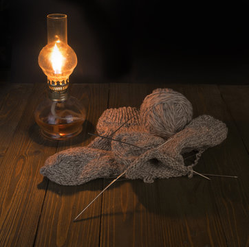 knitting under lamp light