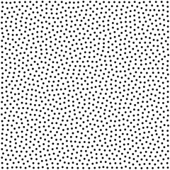 Halftone dotted background. Dotted vector pattern. Chaotic circle dots isolated on the white background.