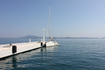 Sailboat In Blue Water