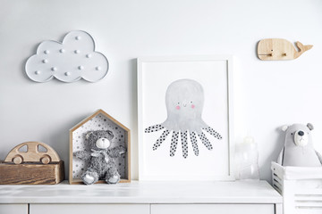 Scandinavian newbornbaby shelf  with mock up photo frame, wooden accessories and toys, teddy bears...