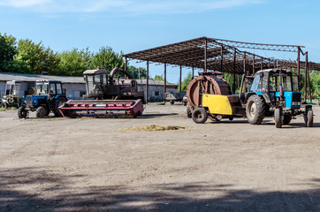 Old agricultural machinery that is not used. Destroyed agriculture in Russia