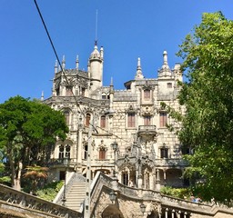 Obraz premium Quinta da Regaleira, Portugal, Sintra. Eccentrically decorated palace and gardens replete with grottoes, fountains, underground tunnels, caves, and numerous statues. UNESCO World Heritage Site