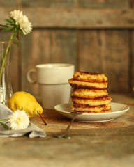 Fototapeta na wymiar pancakes. breakfast and coziness. food background. top view