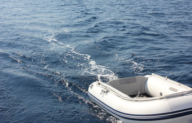 Sailboat In Blue Water