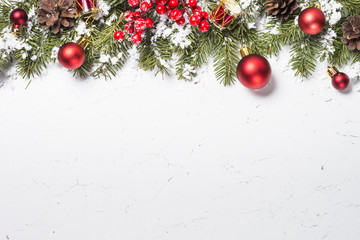 Red christmas decorations on white.